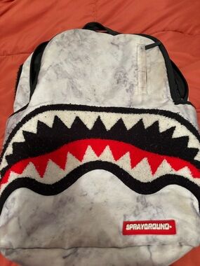 Sprayground Marble Shark Backpack in White, Black, Red